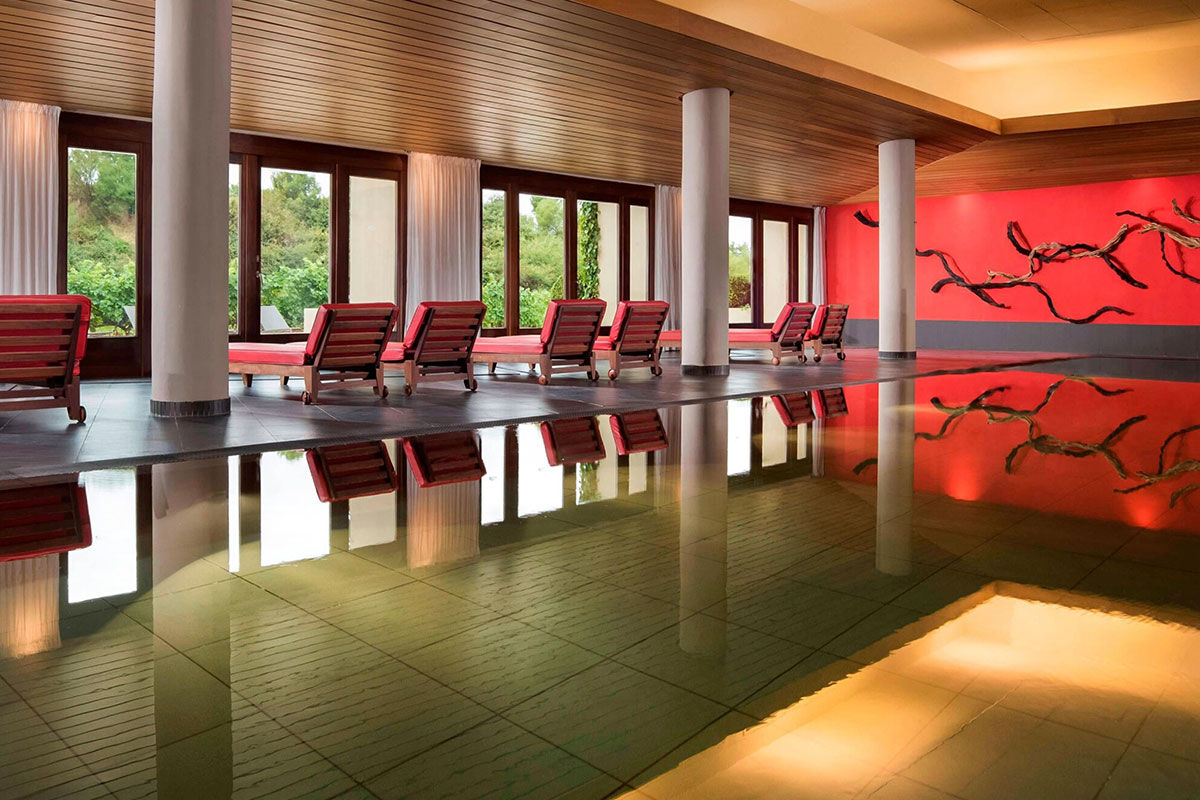 <b>Hotel Marques de Riscal, Elciego</b> - Designed by architect Frank Gehry, the Hotel Marques de Riscal is a piece of artwork in and of itself and has incredible views over the vineyard. Nestled within the medieval village of Elciego, the spectacular curves, titanium roof and avant garde feel is surprising within the region, to say the least!