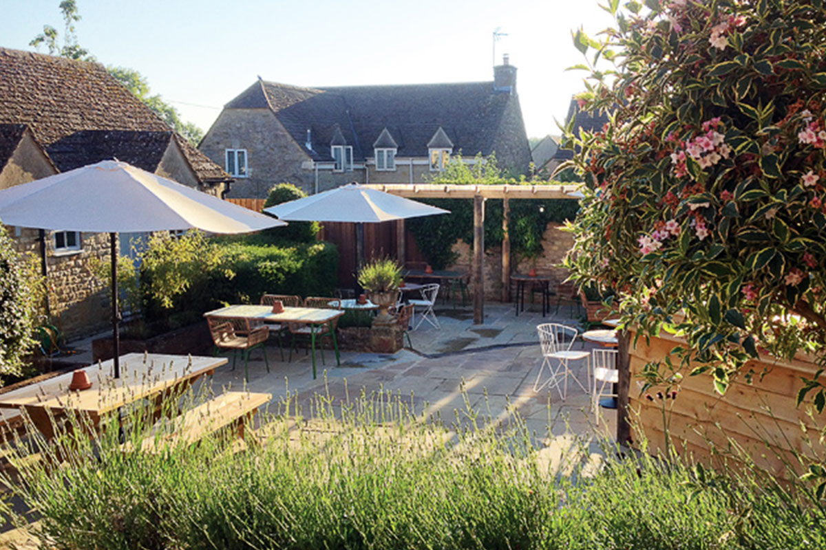 <b>The Old Stocks Inn, Stow-on-the-Wold</b> - This 17th century coaching inn set in Stow-on-the-Wold’s historic market square has been refurbished into a boutique hotel with character and charisma. There’s a historic pub with exposed oak beams and a log fireplace along with an English patio garden and vibrant detailing.