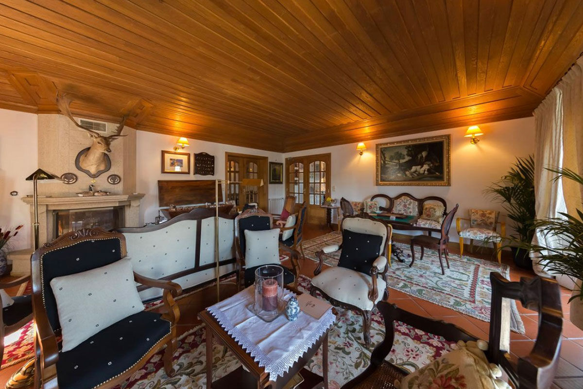 <b>Casa de Sao Domingos, Peso da Regua</b> - This quaint B&B gets its charm from the plants growing in terracotta pots, its stone wall next to the pool, and the sun loungers with parasols. The views of the Duoro River with hills in the background makes for a perfect backdrop for your relaxing vacation.