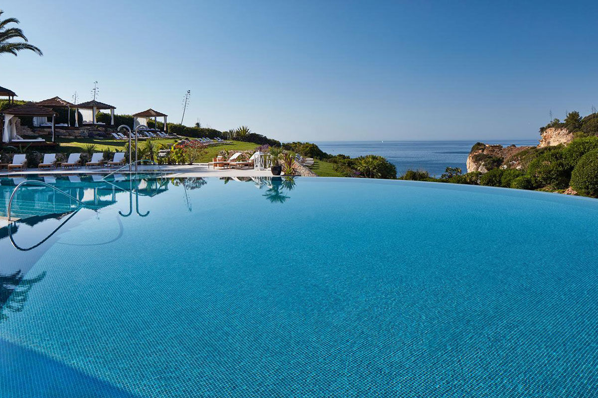 <b>Vila Vita Parc, Porches</b> - Only a 5-minute walk to the Praia dos Tremocos, this Moorish-style hotel sits on a cliff overlooking the Atlantic Ocean, waiting for guests to arrive. Surrounded by lush tropical gardens, this luxury resort has 10 restaurants (one of which is Michelin-starred), 6 bars, tennis courts, pools, and a private beach.