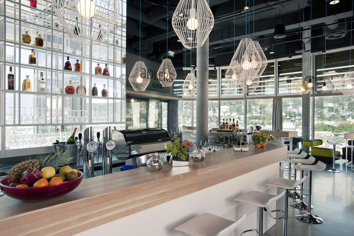<b>Adlers Hotel Innsbruck</b> - Enjoy panoramic views of the city and Tyrolean Alps from this alpine-urban styled hotel in downtown Innsbruck. With newly designed rooms, a Turkish steam bath and sleek rooftop terrace, guests are rejuvenated to venture out and explore.