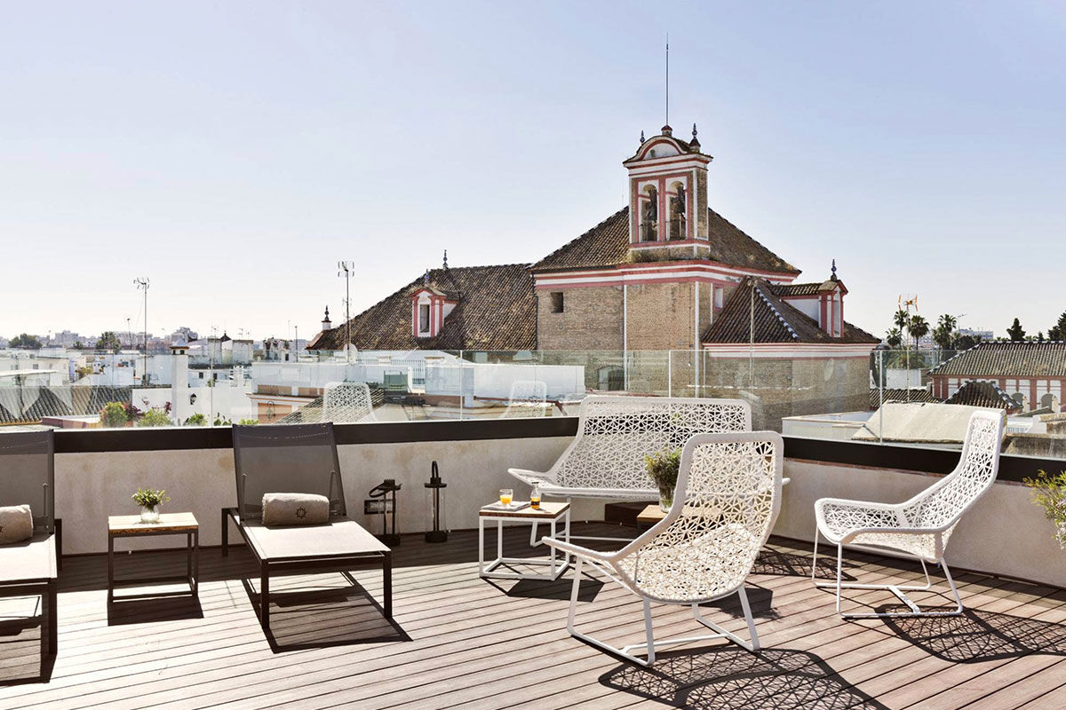 <b>Casa 1800 Sevilla</b> - Just a 2-minute walk from the Catedral de Sevilla, this 1864 mansion is ornate and sophisticated with a neutral toned palette. There’s a rooftop terrace with panoramic city views as well as a complimentary afternoon tea for guests to enjoy.