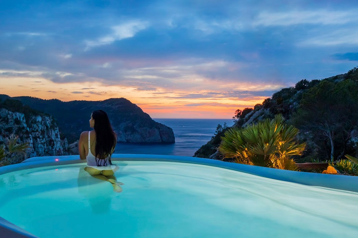 <b>Hacienda Na Xamena, Ibiza</b> - Removed from the clubbing areas of the island, Hacienda Na Xamena is an oasis to rejuvenate your body and overall well-being. The rooms are airy with incredible views, the restaurant and bar have lush plants throughout, and the combination of exposed wood and white-washed walls brings a feeling of freshness to your senses.