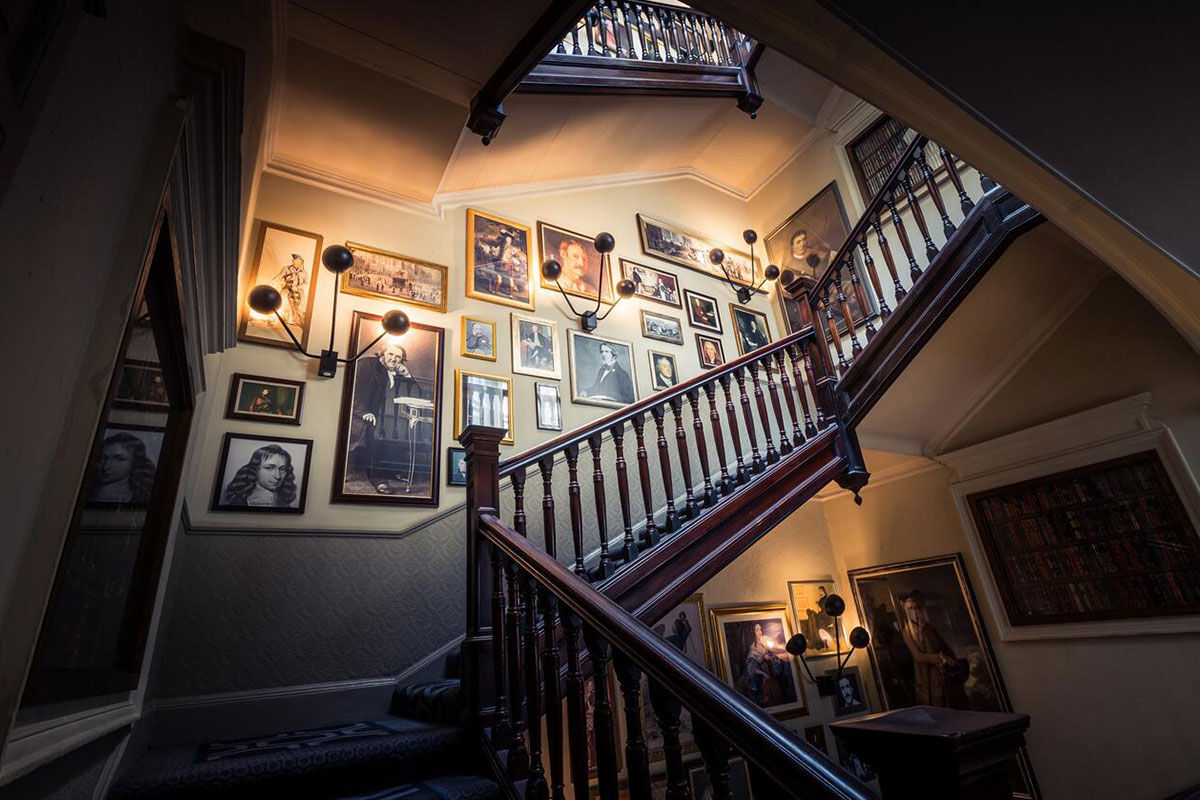 <b>Hotel Indigo Princes Street</b> - Close to museums and castles, this genteel hotel features dark wood, leather and aged photographs throughout, making you feel like you stepped into a moody upscale pub for a delicate cocktail. With tufted furnishings and modern touches, the Hotel Indigo Princes Street is the perfect match of traditional period pieces and contemporary details.