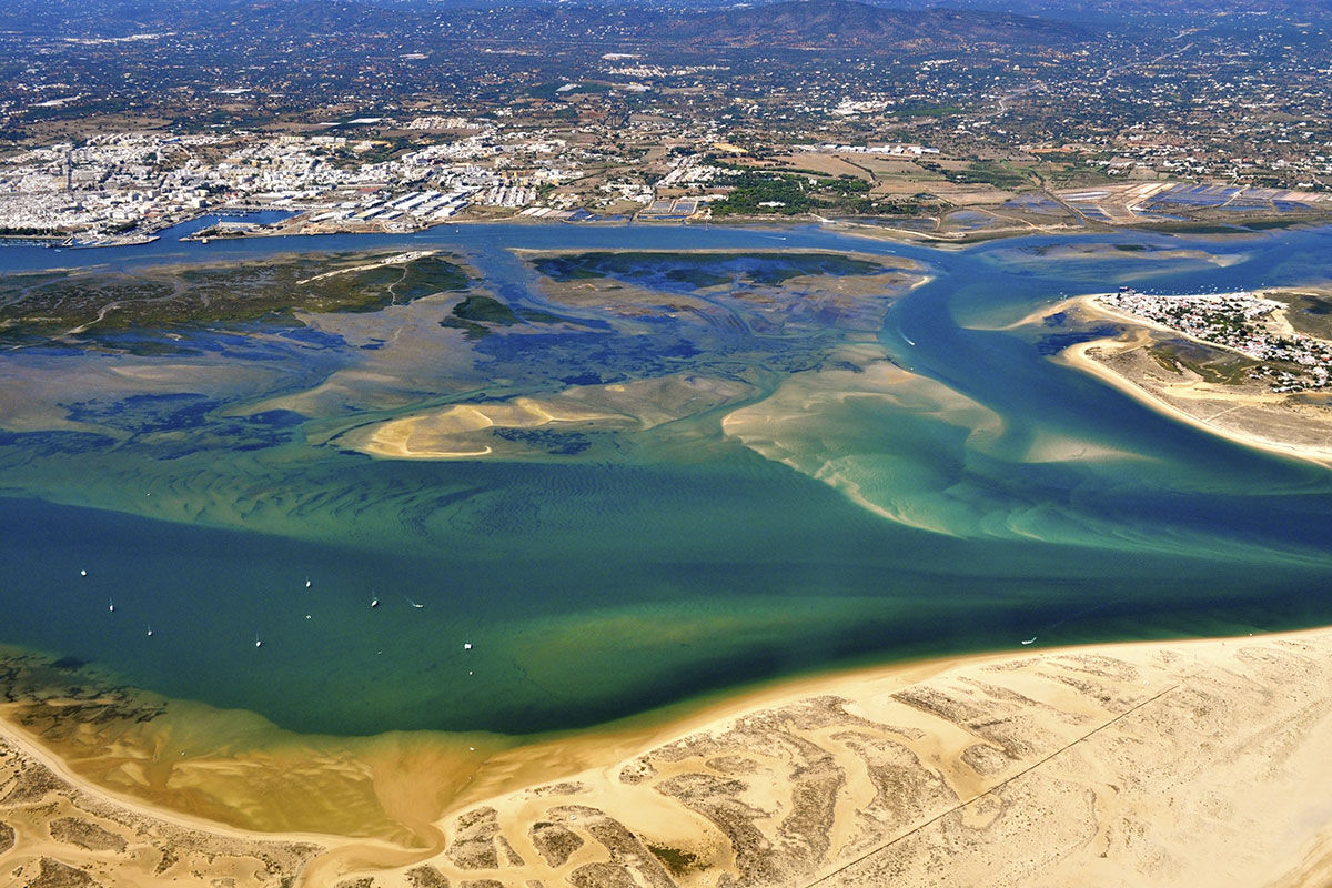 <b>Praia Verde Boutique Hotel, Castro Marim</b> - Set in a pine forest in the heart of Eastern Algarve, not far from the Atlantic Ocean, this sleek hotel attracts the trendiest of travelers. The modern architecture, chic furniture, and Mediterranean restaurant with a wood oven makes guests feel a sort of unfussy luxury during their stay.