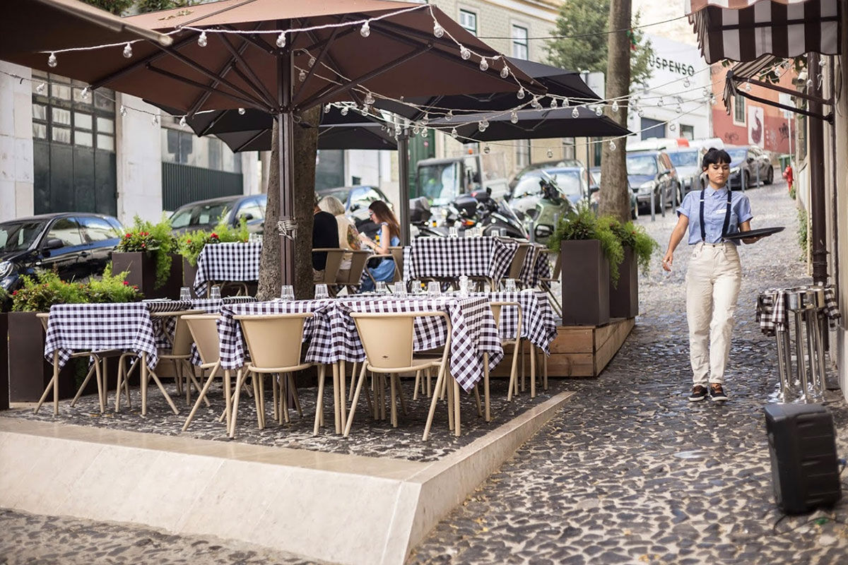 <b>Santiago de Alfama</b> - Within a former palace from the 15th century, this charming boutique hotel is a 9-minute’ walk to the Castelo de Sao and a 13-minute walk to the waterfront plaza Terreiro do Paco. The restaurant serves regional cuisine, the terrace is elegantly furnished, and the rooms have wood floors and paneled ceilings, giving it an overall classic feel.