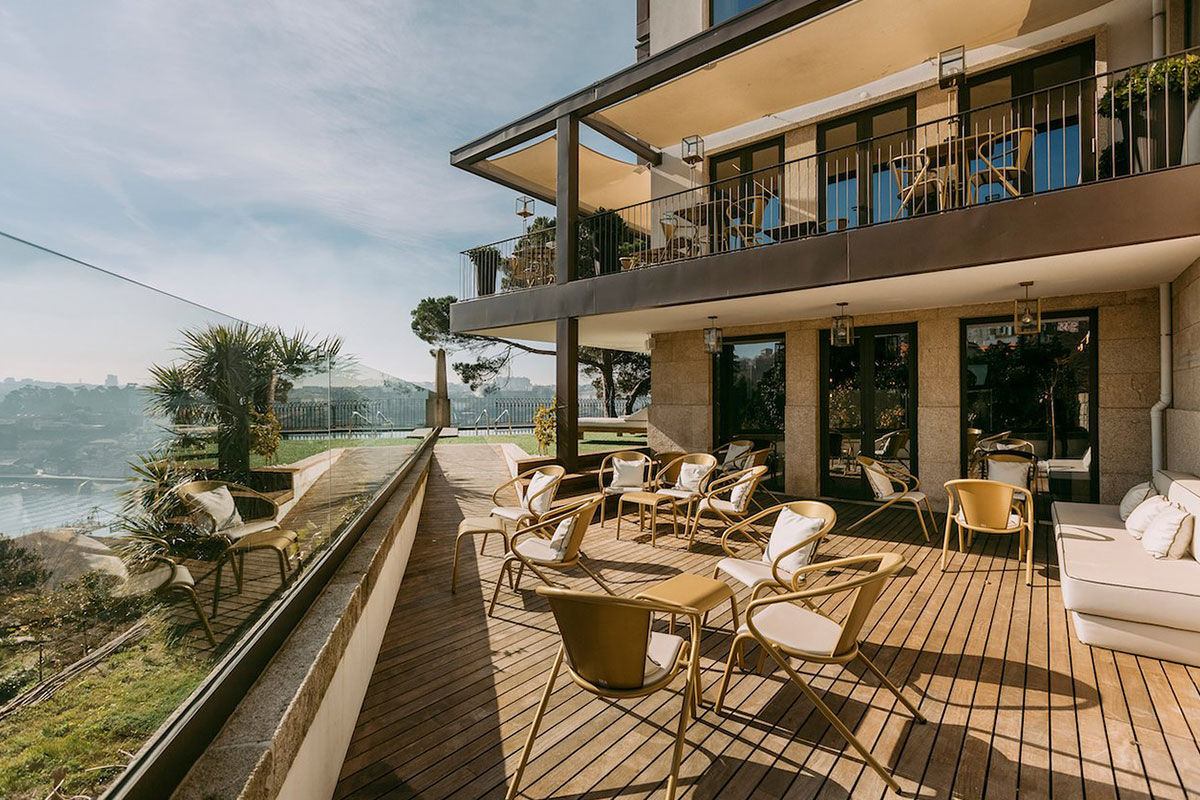 <b>Torel Avantgarde</b> - With views of the winding Douro River, the Torel Avantgarde is set in a 1940s building and comes with charm and class. This upscale hotel is sleek and moody: from the rooms to the restaurant, the pool to the artwork, the bar to the ‘Red Room.’