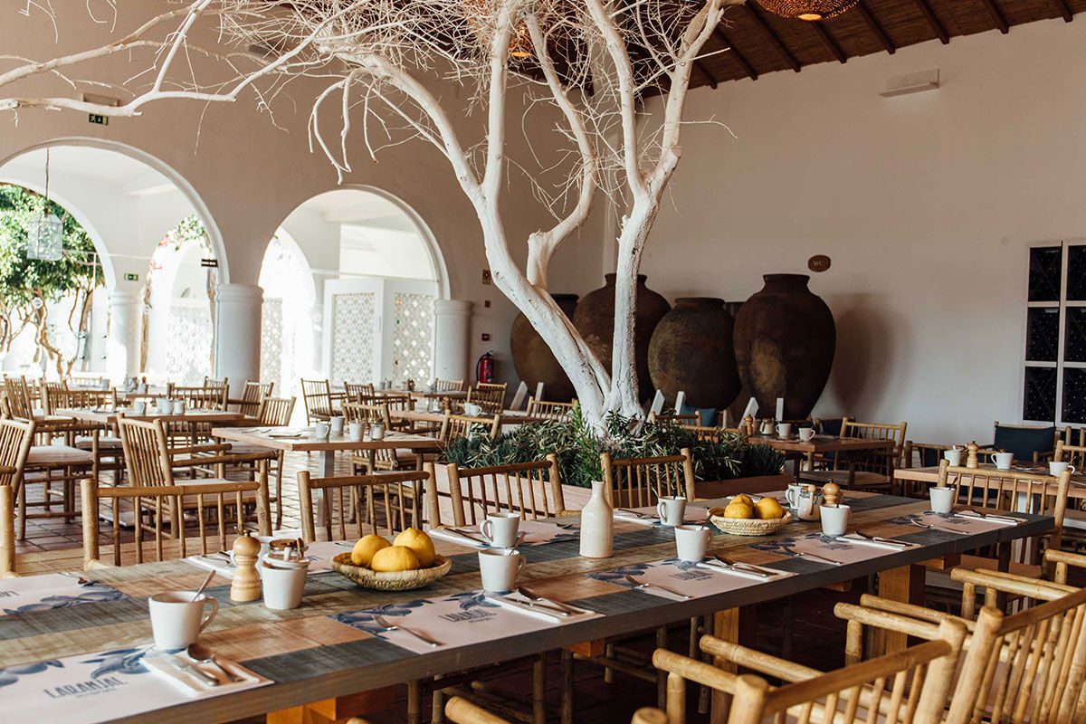 <b>Vila Monte Farm House, Moncarapacho</b> - A whole new level of luxe is introduced at this charming boho villa, inspired by traditional Algarve buildings. Surrounded by citrus trees, the Vila Monte Farm House offers a tranquil retreat for travelers who love lounging by the pool, admiring flowers in the garden and getting cozy by the fireplace.