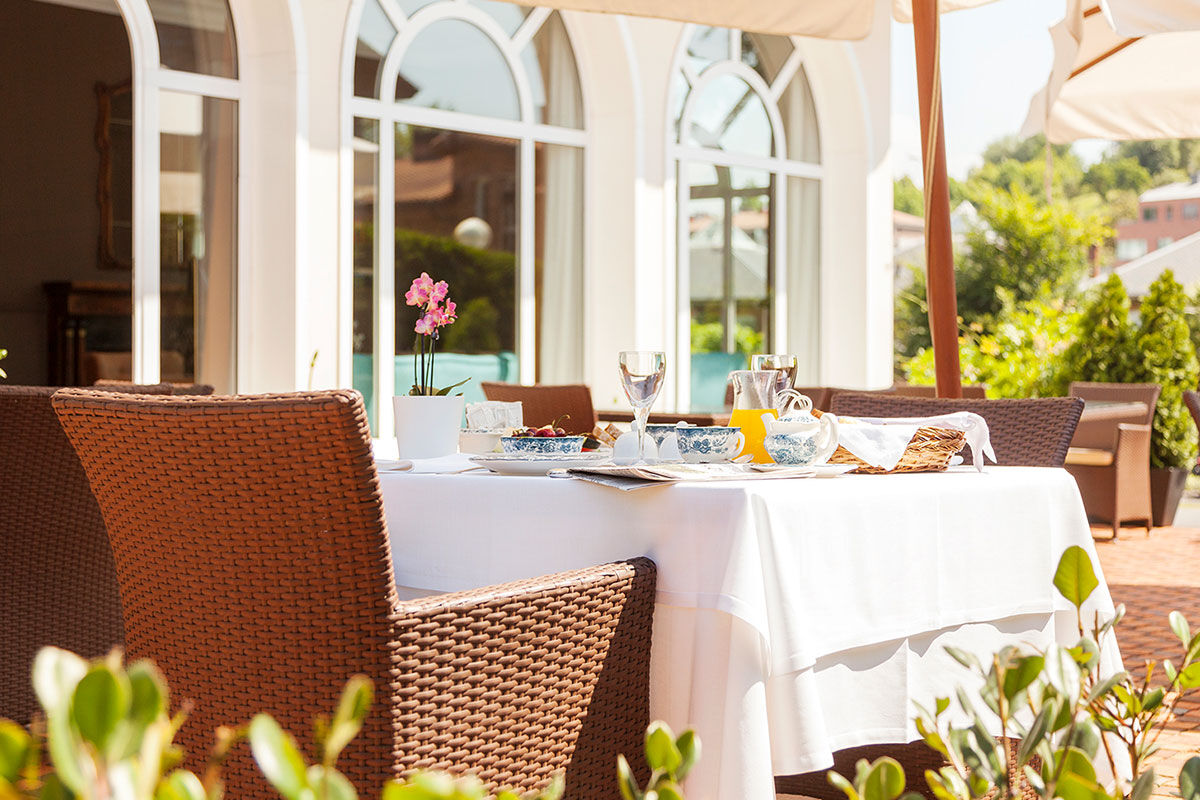 <b>Villa Soro, Donostia</b> - Close to Zurriola beach and San Sebastian Cathedral, Villa Soro occupies two buildings, one of which was built in 1898 and is a Historical Heritage Building of San Sebastian. In that building, the main hallway features a grand stairwell with a stained-glass window and marble floors; the rooms are refined with much natural light. The property boasts a wood-paneled bar and lounge.