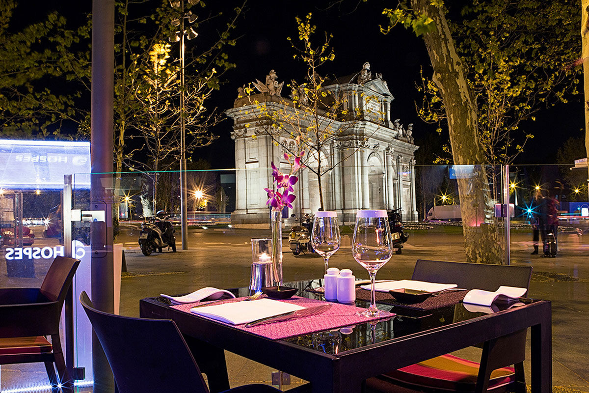 <b>Hotel Hospes Puerta de Alcala</b> - Within Madrid’s Salamanca district, the Hotel Hospes Puerta de Alcala is located in an 1883 building right next to the Puerta de Alcala; guests can dine right in front of it at the Malvar Restaurant. The stylish hotel also features a spa, hammam and relaxation pool.