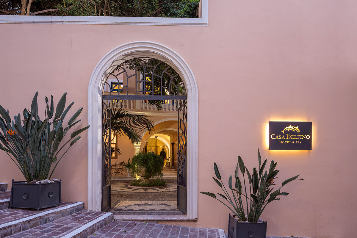 <b>Casa Delfino, Chania</b> - Housed within a 17th century Venetian mansion, this family-run boutique hotel has charm, class and a stunning courtyard with pebbled mosaics. Guests can enjoy a serene spa, rooftop garden or 7-minute walk to the Old Venetian Harbor.