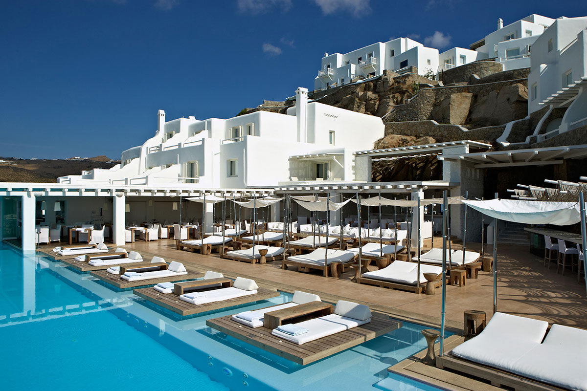 <b>Cavo Tagoo, Imerovigli</b> - Secluded on the hillside, the polished suites offered by the Cavo Tagoo have views of the Aegean Sea and Santorini caldera. Set next to the infinity pool, an airy bar and gourmet restaurant are ready for when you’re feeling peckish.