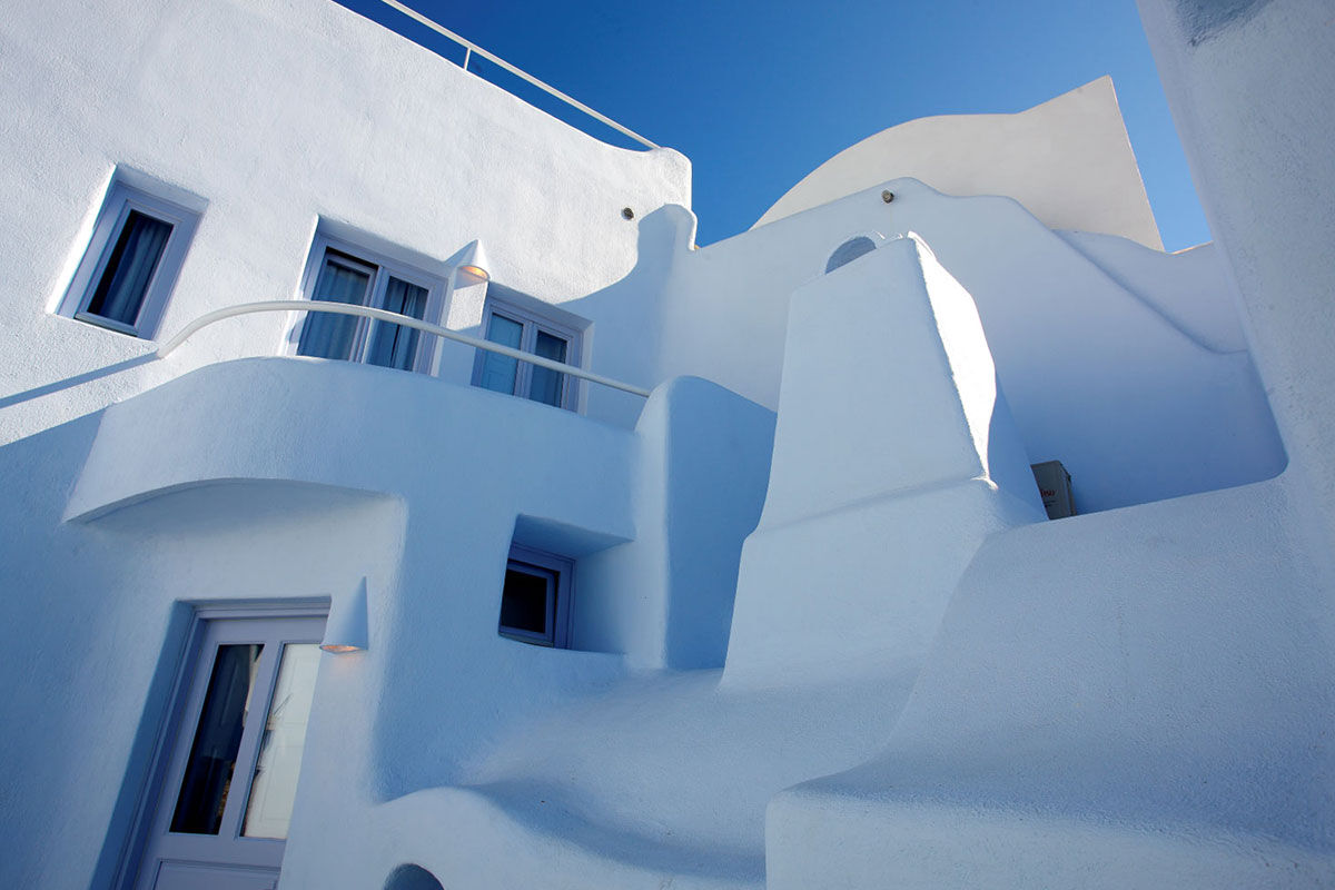 <b>Ikastikies Suites, Firostefani</b> - Set in the picturesque village of Firostefani, and just a short walk from the lively town of Thira, these 4 suites are housed in classic Cycladic-style buildings facing Santorini’s iconic caldera. The Ikastikies suites are bright and charming, the terrace has a pool, and the service goes above and beyond.