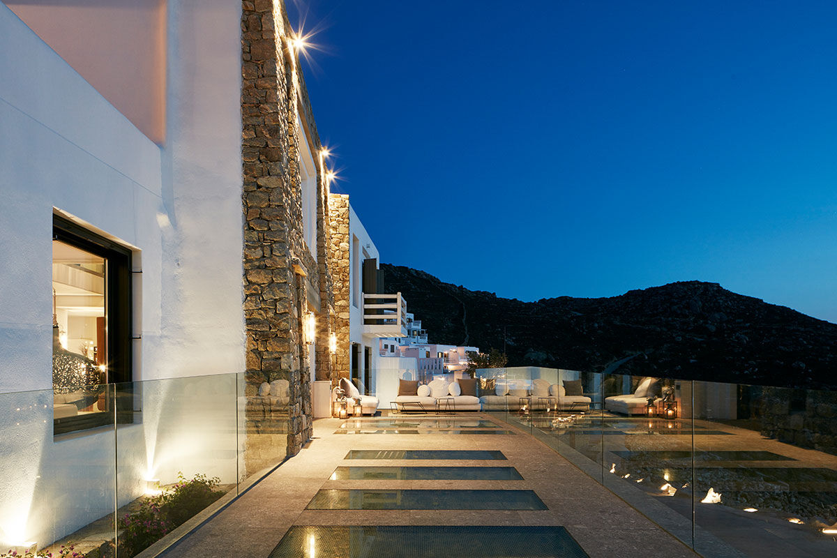 <b>Myconian Avaton, Elia</b> - Newly built in 2014, the Myconian Avaton resort juxtaposes traditional whitewashed exteriors with modern luxe interiors. Set on a private section of Elia Beach, this Cycladic architectural feat has a timeless authenticity that is only enhanced by its infinity pools, fine dining and contemporary furnishings.