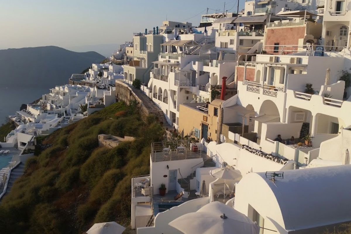 <b>Sunny Villas, Imerovigli</b> - With breathtaking views of the Aegean Sea, this relaxed hotel offers bright and airy accommodations with a pool and adjoining bar. With only a 5-minute walk to Skaros Rock, guests can venture out on the hillside and admire the white-washed village of Imerovigli, or walk further into the town of Thira.