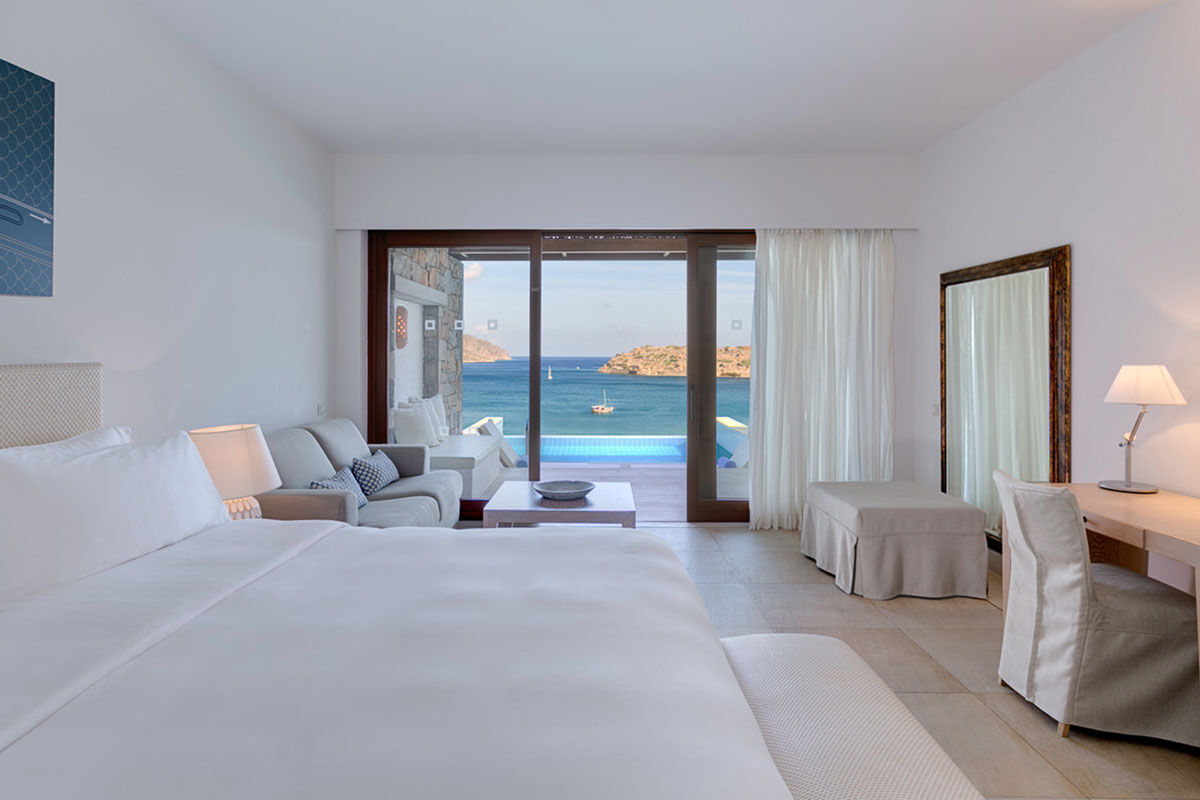 <b>Blue Palace, Elounda</b> - Tucked away on the Gulf of Elounda, the Blue Palace welcomes guests with refined, contemporary bungalows and breathtaking architecture. A real modern luxury experience, this resort features five restaurants, three bars, a spa, gym, and private beach.