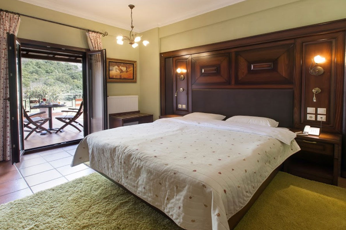 <b>Dellas Boutique Hotel, Kastraki</b> - With views of Meteora’s rocky landforms, this down to earth hotel features dark wood furnishings and stonework, bringing a natural feel to your stay. Meteora is classed as a World Heritage Site and the nearby monasteries are built on 14th century sandstone rock pillars — you won’t want to miss these natural beauties.