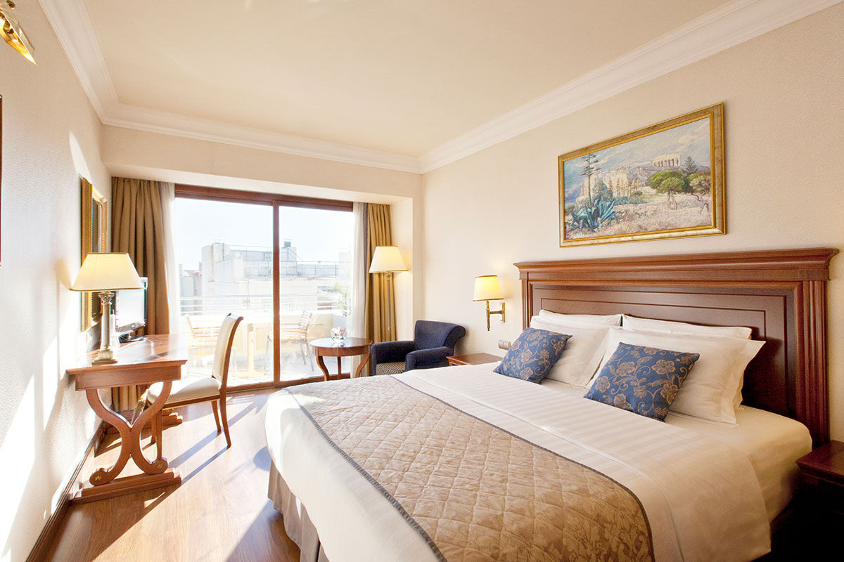 <b>Electra Palace</b> - Nestled in the center of the Old Town, Electra Palace is a 15-minute stroll to the Acropolis and Parthenon. With a Mediterranean eatery, rooftop restaurant, spa and pool, this upscale hotel is hospitable and aristocratic.