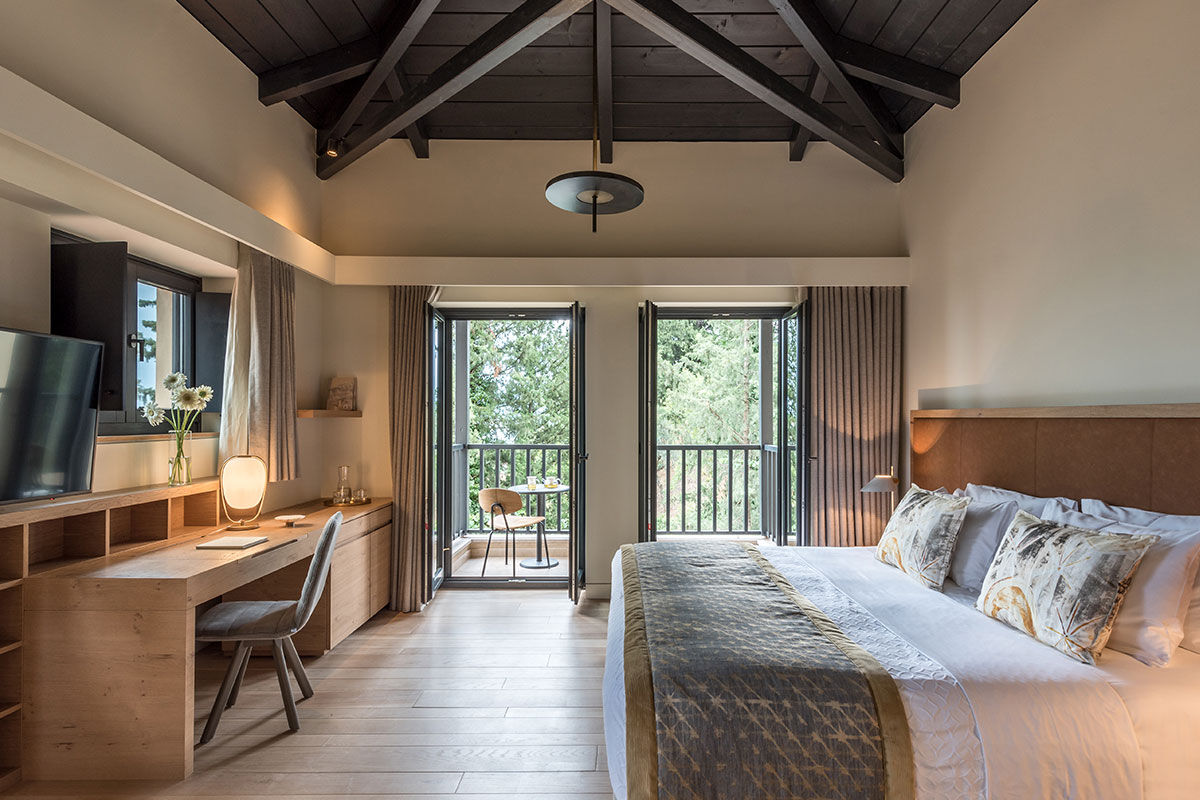 <b>Euphoria Retreat, Mystras</b> - Nestled in the hills of the Peloponnese peninsula, the Euphoria Retreat is a holistic wellbeing spa featuring an infinity pool, sphere pool and views of the mythical mountains. With earthy colors and a modern design scheme, this retreat center finds balance with nature and ancient medicine.