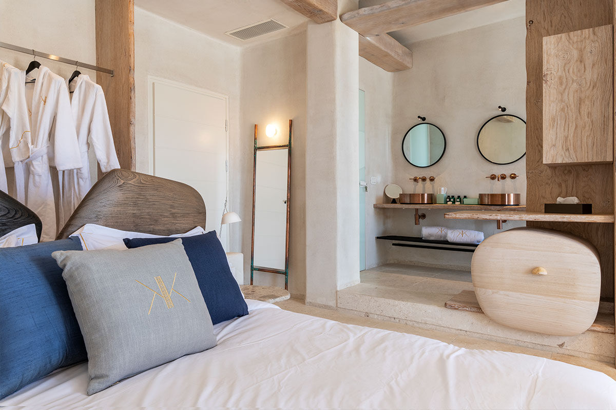 <b>Kensho, Psarou</b> - Nestled on Psarou Beach, Kensho is a clean, minimalist hotel with aged wood and stone trimmings. Rooms are contemporary and spacious, and guests can mingle at the poolside bar and restaurant with views of the crystal blue sea.