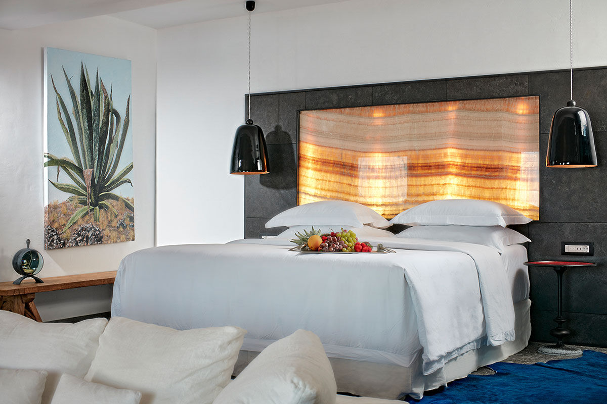 <b>Myconian Avaton, Elia</b> - Newly built in 2014, the Myconian Avaton resort juxtaposes traditional whitewashed exteriors with modern luxe interiors. Set on a private section of Elia Beach, this Cycladic architectural feat has a timeless authenticity that is only enhanced by its infinity pools, fine dining and contemporary furnishings.