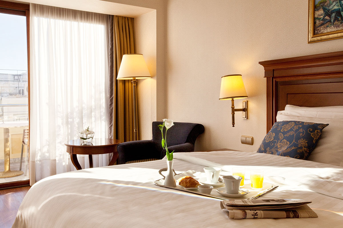 <b>Electra Palace</b> - Nestled in the center of the Old Town, Electra Palace is a 15-minute stroll to the Acropolis and Parthenon. With a Mediterranean eatery, rooftop restaurant, spa and pool, this upscale hotel is hospitable and aristocratic.