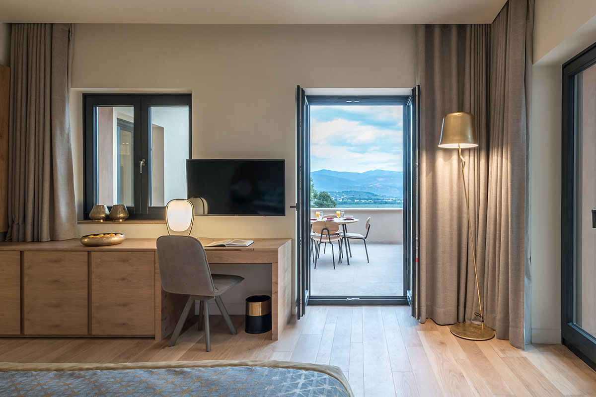 <b>Euphoria Retreat, Mystras</b> - Nestled in the hills of the Peloponnese peninsula, the Euphoria Retreat is a holistic wellbeing spa featuring an infinity pool, sphere pool and views of the mythical mountains. With earthy colors and a modern design scheme, this retreat center finds balance with nature and ancient medicine.