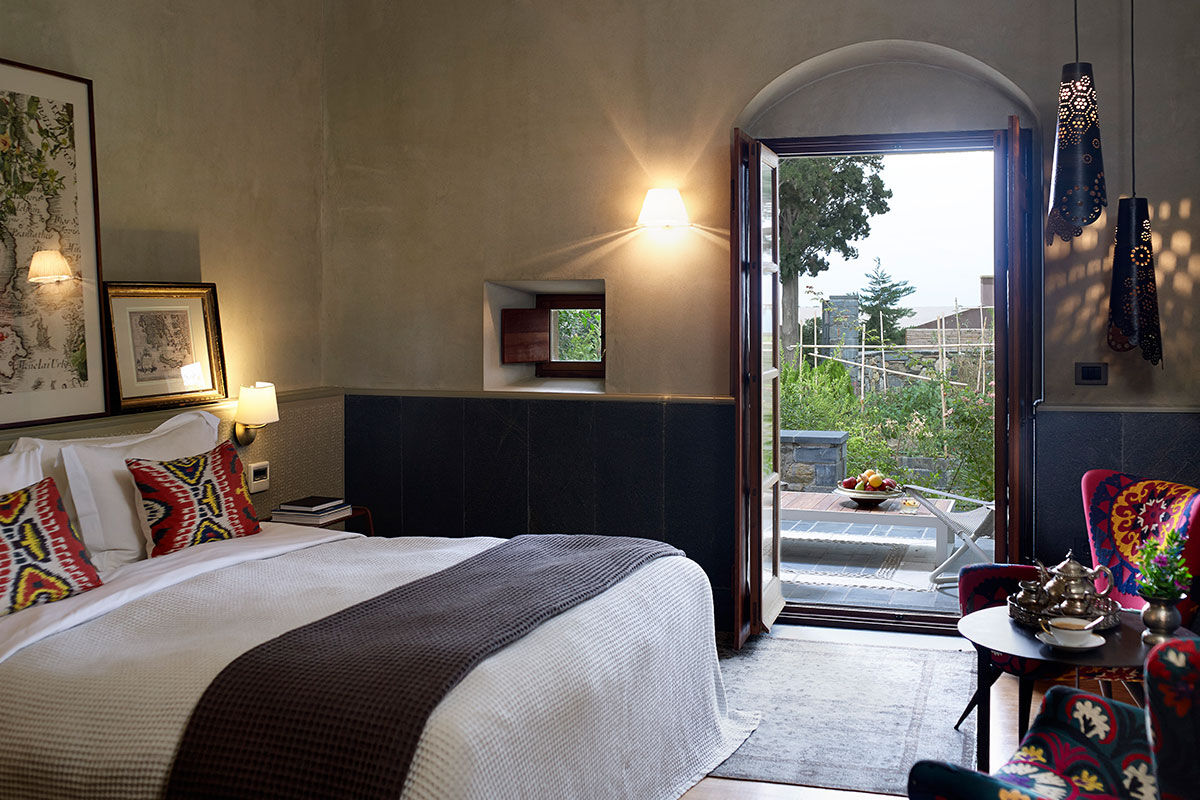 <b>Kinsterna, Monemvasia</b> - Set on a hilltop overlooking the Aegean Sea, this upscale hotel embraces guests with its stone walls, vine-covered terraces and lush Mediterranean gardens that are filled will citrus trees. Within this fairytale historic mansion, there are two pools, three restaurants and a sauna/steam room as well as café, bar, and kids’ playground.