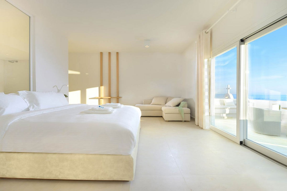 <b>Nissaki, Platis Yialos</b> - Surrounded by golden sunlight and clear blue waters, this luxury boutique hotel is set in traditional whitewashed buildings and features clean, streamline furnishings. Guests dine next to the Aegean Sea, swim in one of two pools with sun loungers nearby, and are only steps away from the renowned Platis Yialos Beach.