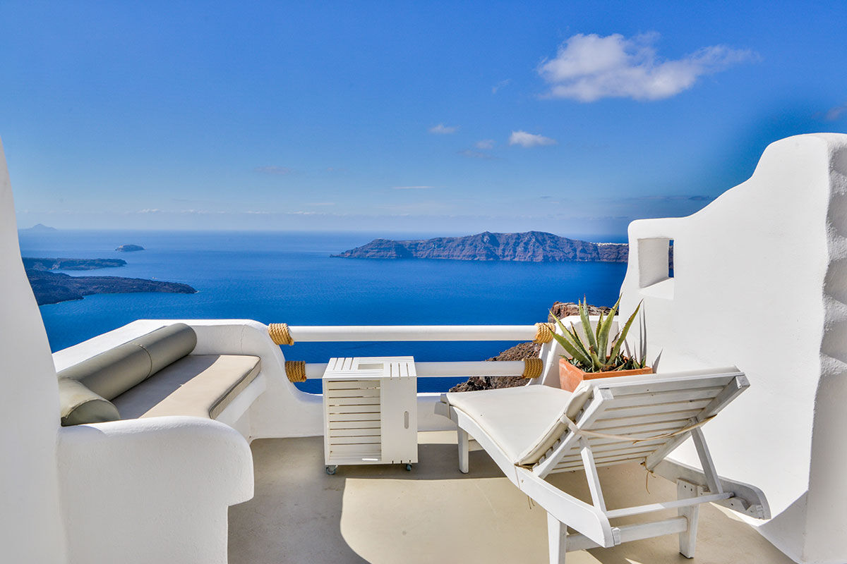 <b>Sunny Villas, Imerovigli</b> - With breathtaking views of the Aegean Sea, this relaxed hotel offers bright and airy accommodations with a pool and adjoining bar. With only a 5-minute walk to Skaros Rock, guests can venture out on the hillside and admire the white-washed village of Imerovigli, or walk further into the town of Thira.