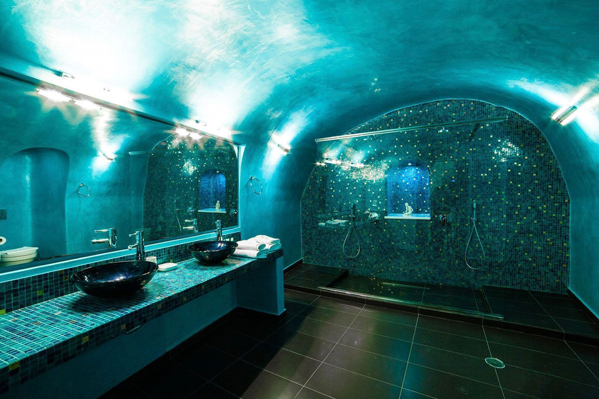 <b>Anteliz, Fira</b> - Airy and elegant with the essence of Theran design, the Anteliz Suites are perched on a hilltop overlooking the Aegean Sea. Close to the town of Fira, this boutique hotel offers panoramic views from the terrace where you can drift in the pool or relax in the hydro-massage hot tub.