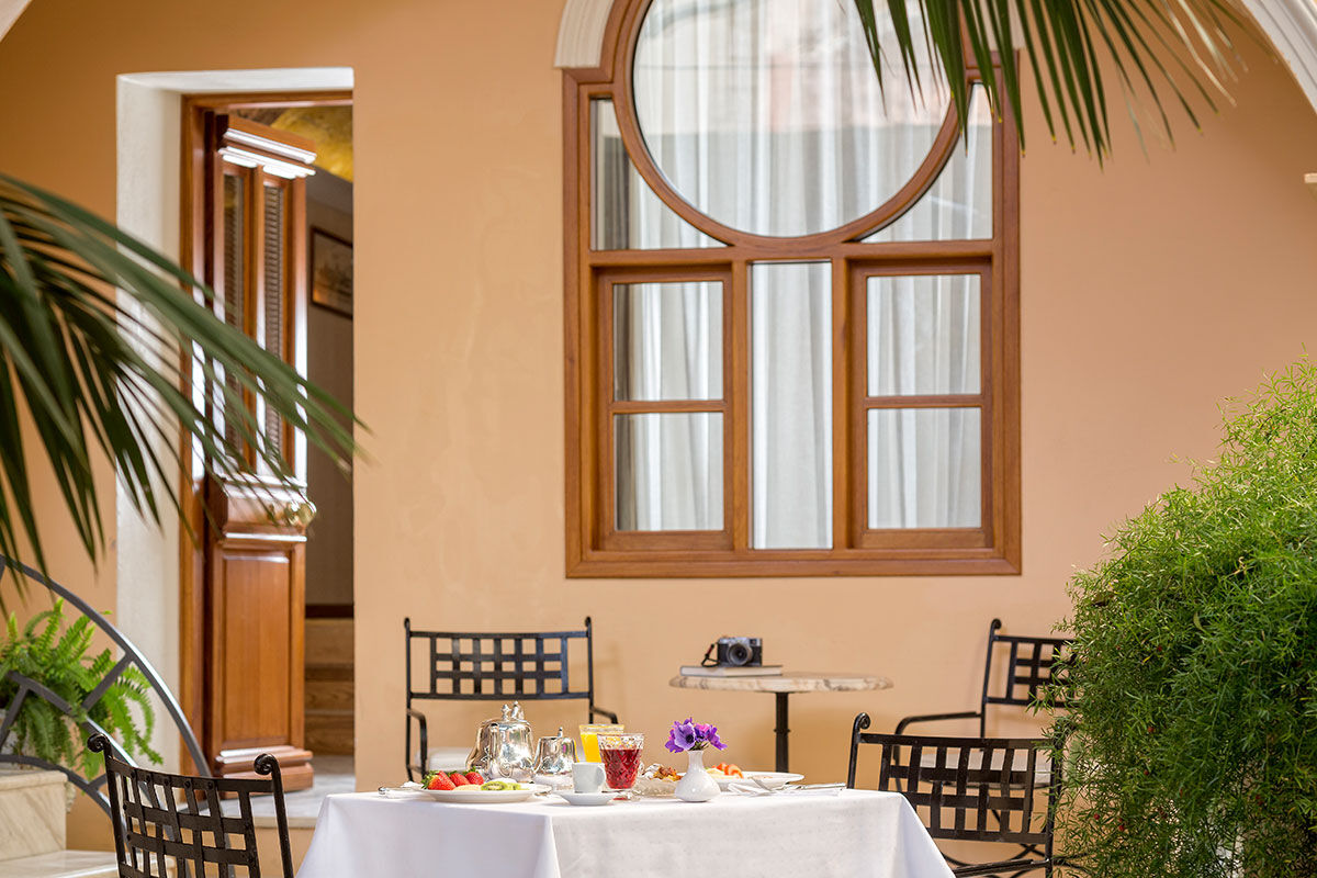 <b>Casa Delfino, Chania</b> - Housed within a 17th century Venetian mansion, this family-run boutique hotel has charm, class and a stunning courtyard with pebbled mosaics. Guests can enjoy a serene spa, rooftop garden or 7-minute walk to the Old Venetian Harbor.