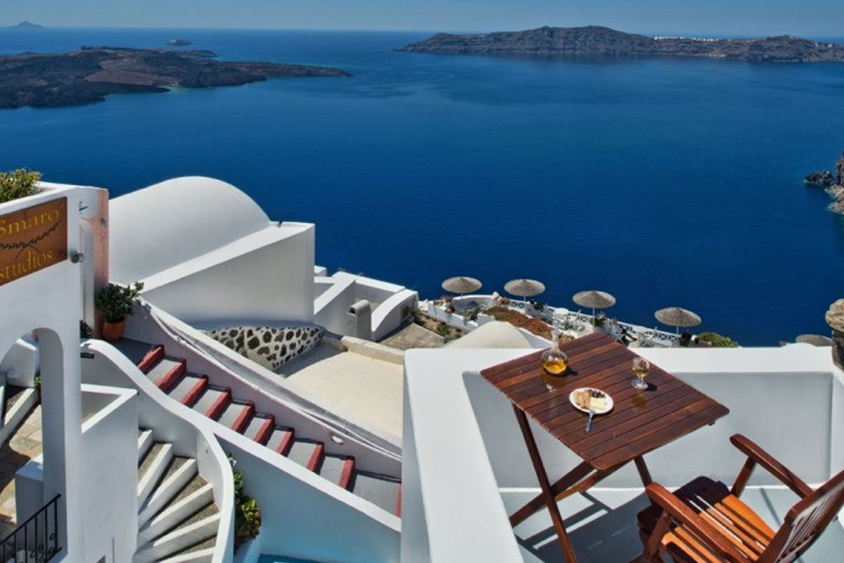 <b>Ikastikies Suites, Firostefani</b> - Set in the picturesque village of Firostefani, and just a short walk from the lively town of Thira, these 4 suites are housed in classic Cycladic-style buildings facing Santorini’s iconic caldera. The Ikastikies suites are bright and charming, the terrace has a pool, and the service goes above and beyond.