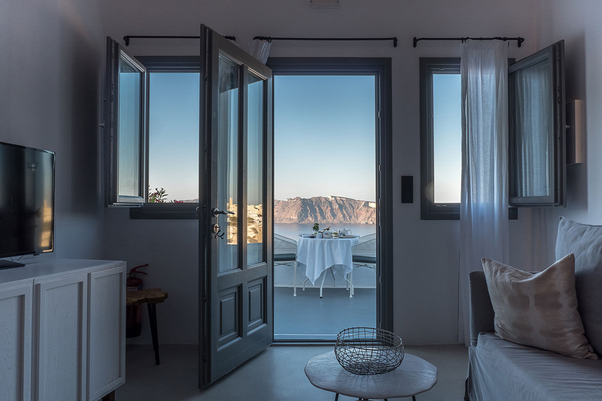 <b>Ikies Traditional Houses, Oia</b> - Comprised of 11 romantic guesthouses, Ikies is the perfect getaway for couples to relax and enjoy views of the Caldera and volcano. All suites have terraces, and their services department can help arrange sailing excursions, scuba diving or sight-seeing tours.