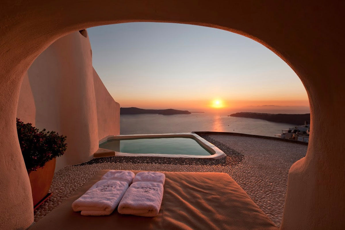 <b>Kapari Natural Resort, Imerovigli</b> - Housed in a 300-year-old Cycladic building, Kapari is an upscale hotel with minimalist décor and caldera views. Only a 30-minute scenic stroll to the hustle and bustle of Thira, Kapari is a tranquil retreat with a rooftop pool and fine dining restaurant/bar.