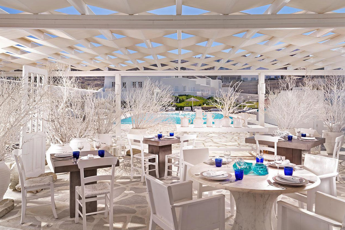 <b>Mykonos Bay, Mykonos Town</b> - Set on a sandy beach, and a short walk into town, Mykonos Bay Hotel offers the best of both worlds. It features bright rooms with whitewashed walls, a restaurant with Mediterranean cuisine, an outdoor saltwater pool, poolside bar — even bikes for loan. What more could you ask from this Aegean dream?