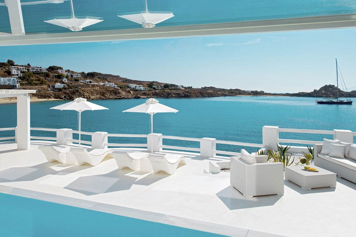 <b>Petasos Resort & Spa, Platis Yialos</b> - Sitting on a private peninsula and overlooking the Aegean Sea, the newly renovated Petasos Resort & Spa is Mediterranean luxury at its finest. With airy rooms, VIP restaurant, spa and a pool with views of the yachts in the Bay of Psarou, guests can enjoy privacy and peaceful tranquility.