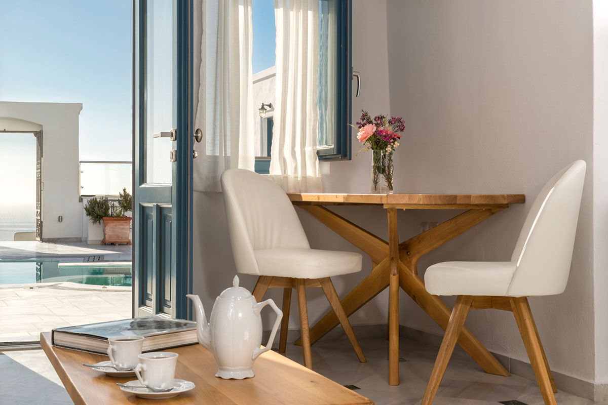 <b>Anteliz, Fira</b> - Airy and elegant with the essence of Theran design, the Anteliz Suites are perched on a hilltop overlooking the Aegean Sea. Close to the town of Fira, this boutique hotel offers panoramic views from the terrace where you can drift in the pool or relax in the hydro-massage hot tub.