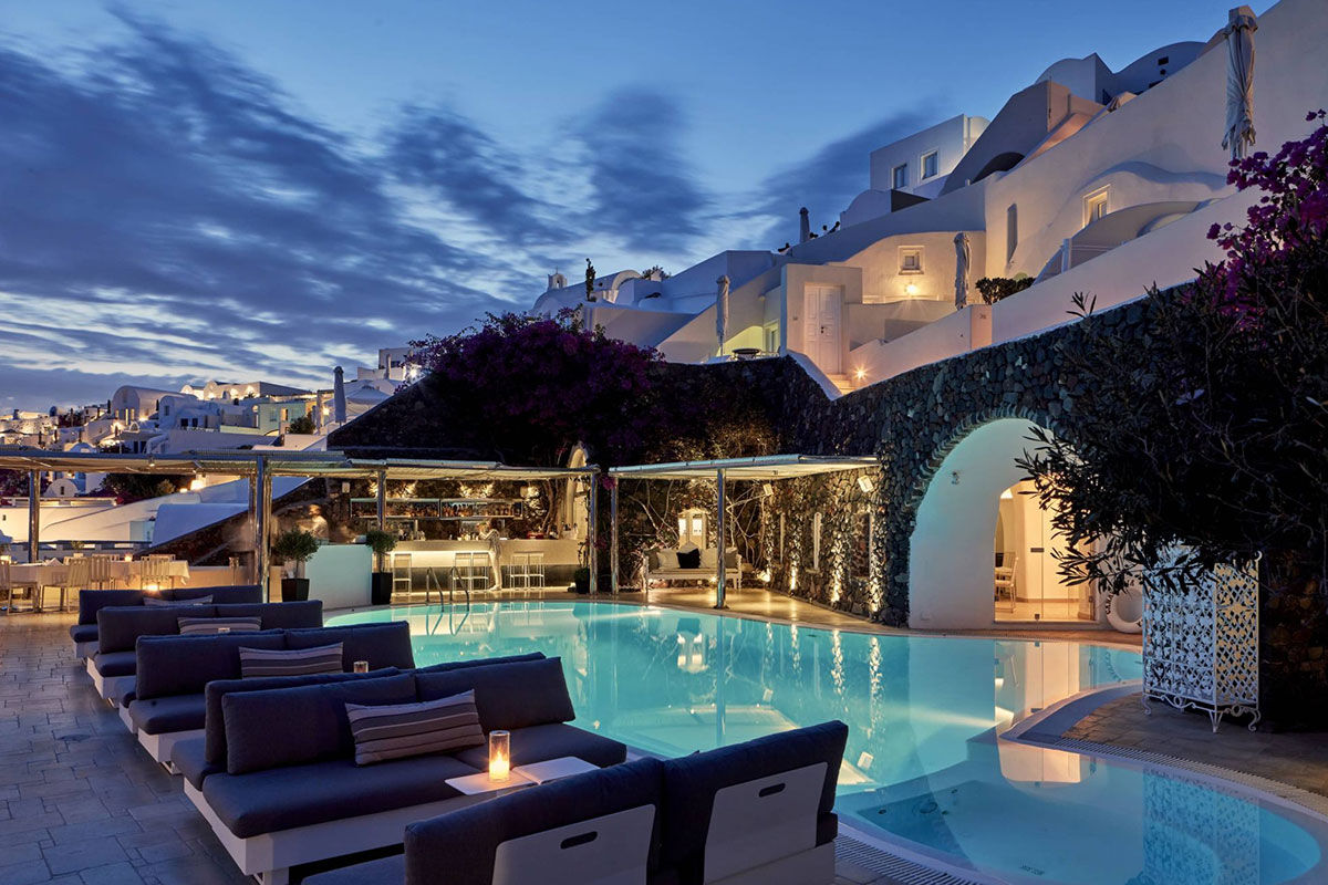 <b>Canaves Oia Suites, Oia</b> - Enveloped by the emerald Aegean and dramatic beauty of Santorini, the Canaves Oia Suites invites guests seeking luxury and elegance with modern furnishings and Caldera views. The Petra Restaurant & Bar serves Greek cuisine with a creative twist and the spa hosts yoga classes for the mindful traveler.