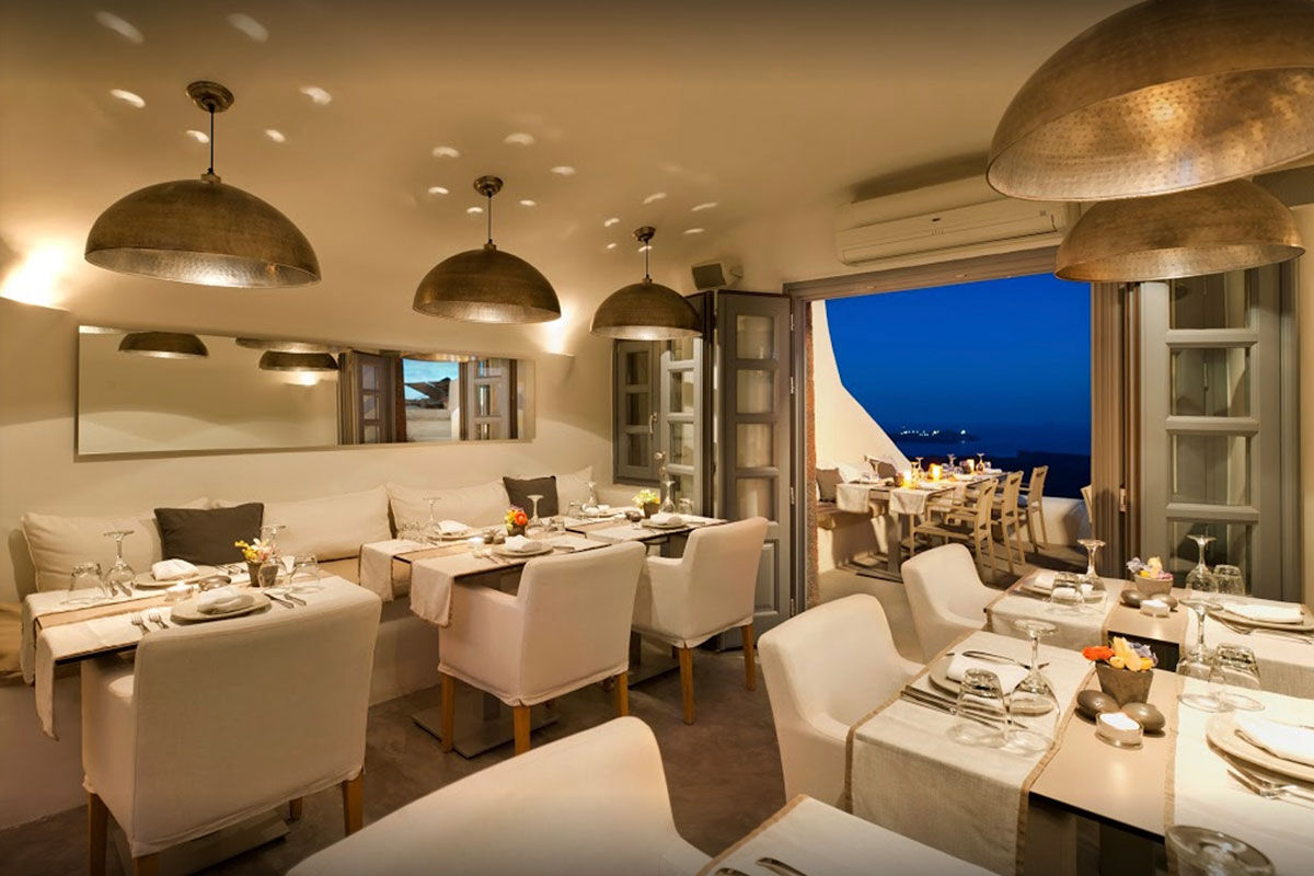 <b>Kapari Natural Resort, Imerovigli</b> - Housed in a 300-year-old Cycladic building, Kapari is an upscale hotel with minimalist décor and caldera views. Only a 30-minute scenic stroll to the hustle and bustle of Thira, Kapari is a tranquil retreat with a rooftop pool and fine dining restaurant/bar.