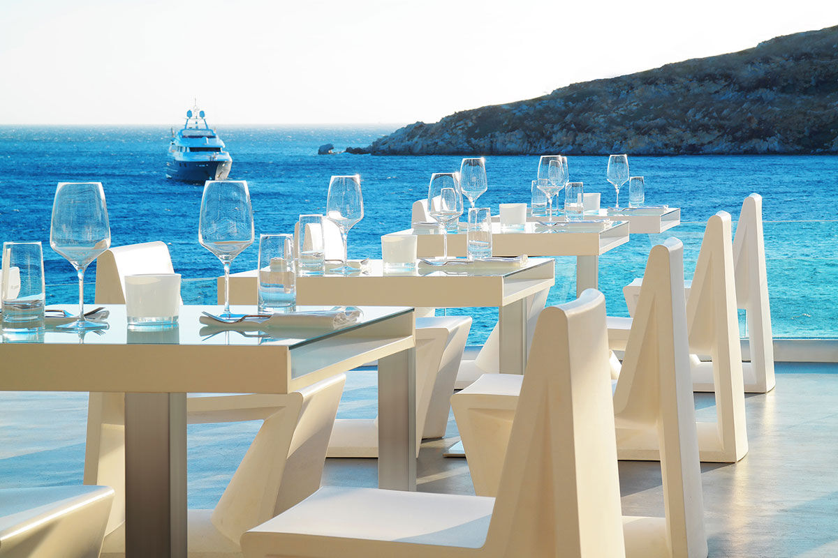 <b>Petasos Resort & Spa, Platis Yialos</b> - Sitting on a private peninsula and overlooking the Aegean Sea, the newly renovated Petasos Resort & Spa is Mediterranean luxury at its finest. With airy rooms, VIP restaurant, spa and a pool with views of the yachts in the Bay of Psarou, guests can enjoy privacy and peaceful tranquility.