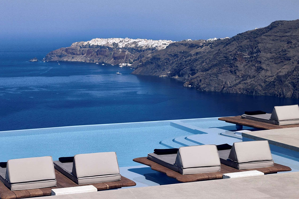 <b>Cavo Tagoo, Imerovigli</b> - Secluded on the hillside, the polished suites offered by the Cavo Tagoo have views of the Aegean Sea and Santorini caldera. Set next to the infinity pool, an airy bar and gourmet restaurant are ready for when you’re feeling peckish.