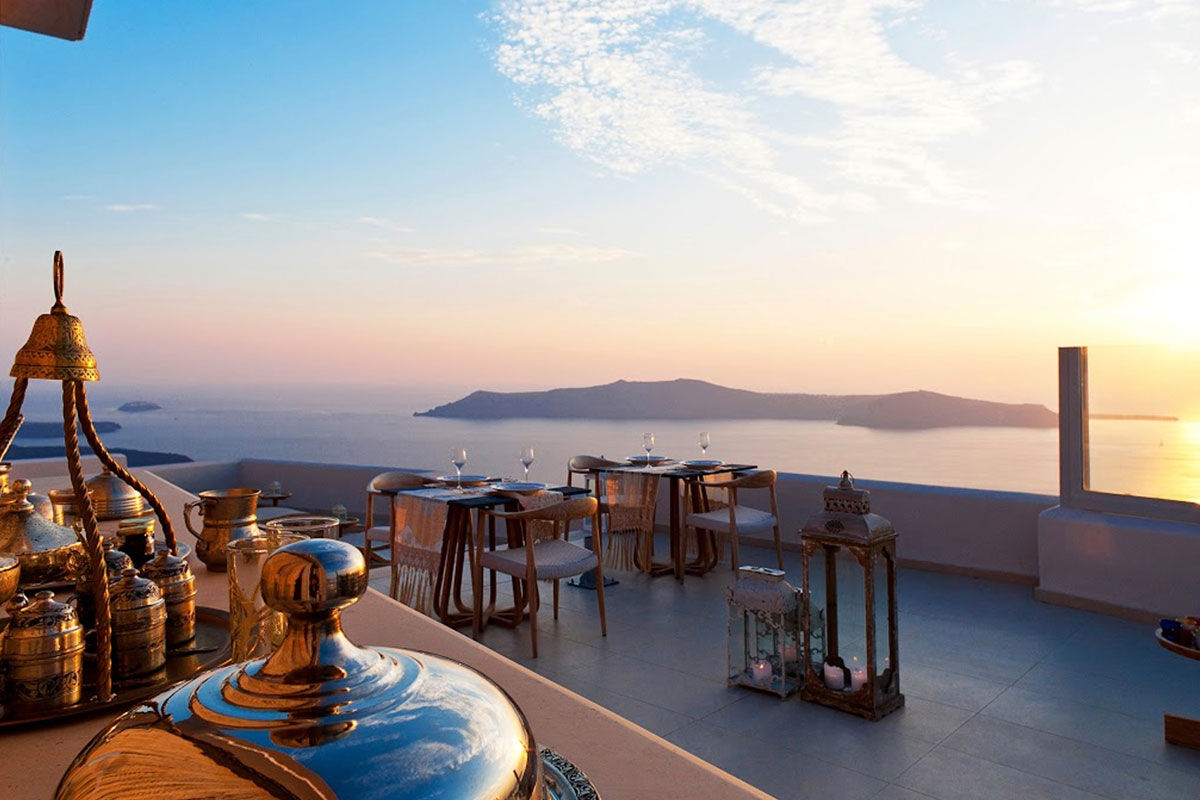 <b>Gold Suites, Imerovigli</b> - Located on the cliffside overlooking the Santorini Caldera, the Gold Suites offer spacious suites with a little glam. The infinity pool, poolside bar and open-air restaurant all face the Aegean Sea — and yet, you certainly will never tire of these views.