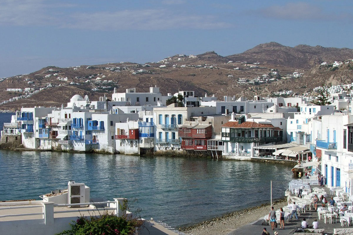 <b>Kensho, Psarou</b> - Nestled on Psarou Beach, Kensho is a clean, minimalist hotel with aged wood and stone trimmings. Rooms are contemporary and spacious, and guests can mingle at the poolside bar and restaurant with views of the crystal blue sea.