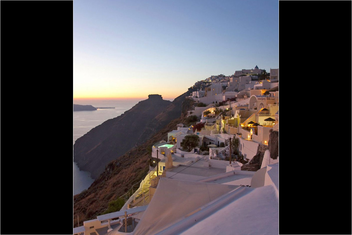 <b>Gold Suites, Imerovigli</b> - Located on the cliffside overlooking the Santorini Caldera, the Gold Suites offer spacious suites with a little glam. The infinity pool, poolside bar and open-air restaurant all face the Aegean Sea — and yet, you certainly will never tire of these views.