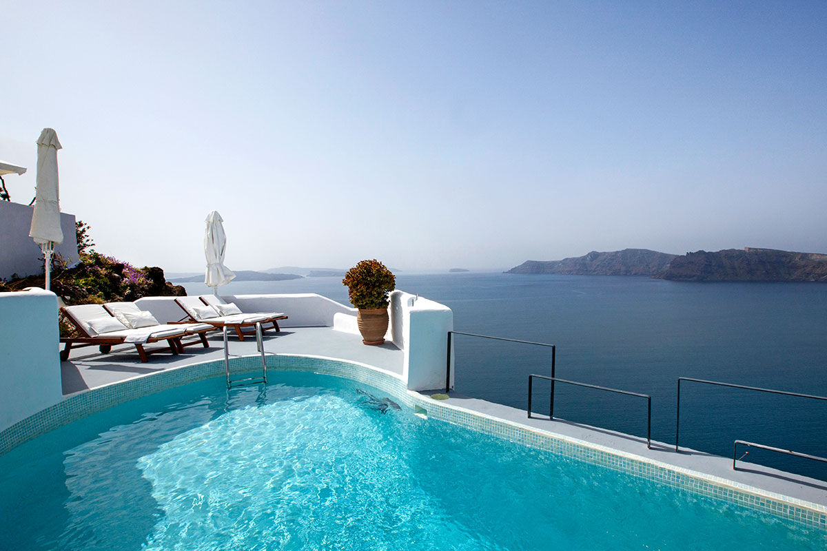 <b>Ikies Traditional Houses, Oia</b> - Comprised of 11 romantic guesthouses, Ikies is the perfect getaway for couples to relax and enjoy views of the Caldera and volcano. All suites have terraces, and their services department can help arrange sailing excursions, scuba diving or sight-seeing tours.