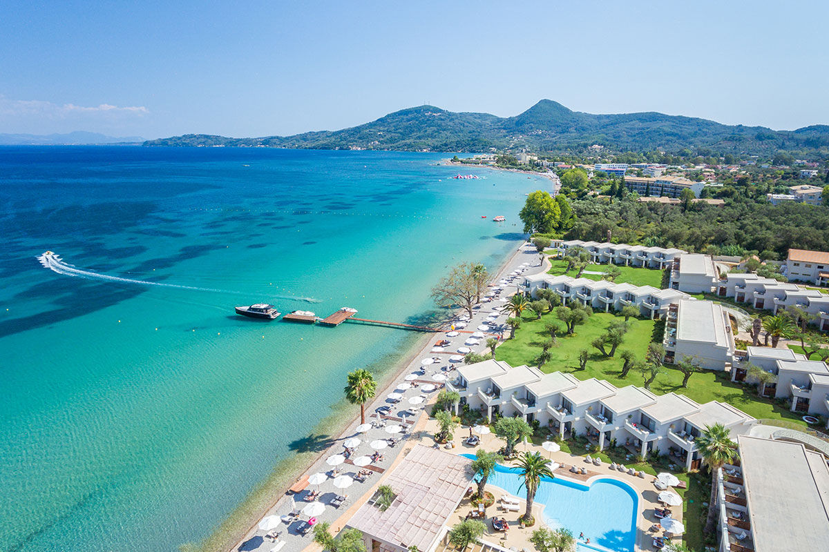 <b>Domes Miramare, a Luxury Collection Resort, Moraitika</b> - Walk along the private white sand beach before heading to the Blue Bar for some pre-dinner drinks at this refined adult-only resort. After that, head over to the raw bar or take a sunset dip in the infinity pool before retreating to your classic upscale room with a view.