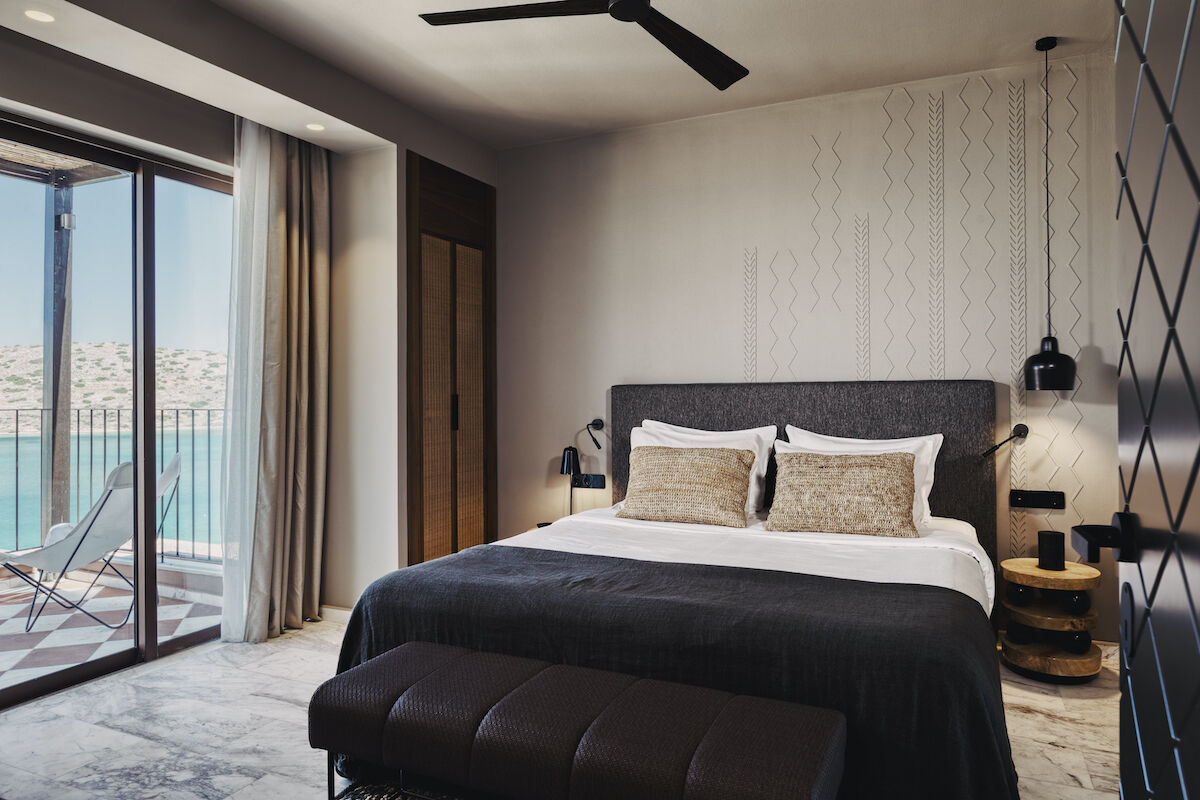 <b>Domes of Elounda, Autograph Collection, Elounda</b> - With views of the Aegean Sea, the newly renovated Domes of Elounda feature sleek, plush rooms as well as four restaurants, four bars, a pool, tennis court and access to a private beach. Mediterranean luxury at its finest.