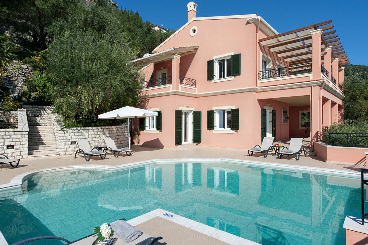 <b>Kaminaki Villas, Nissaki</b> - Conveniently located steps away from the pebble beach that bares the same name, the Kaminaki Villas have a cozy feel that welcomes guests upon arrival. This home-away-from-home has a terrace, pool and outdoor dining area where you can prepare a homemade meal for your family.