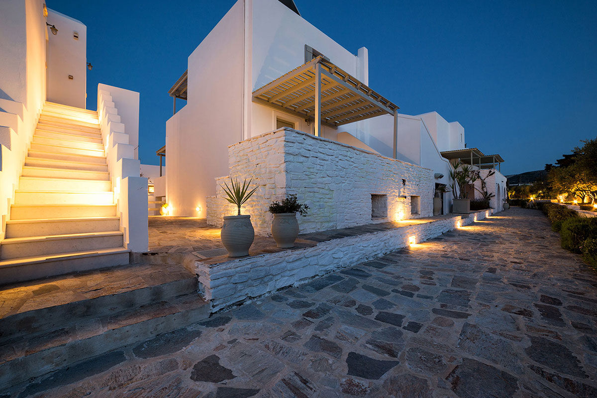 <b>Saint Andrea Seaside Resort, Naoussa</b> - Comprised of traditional Cycladic buildings centered around a sleek aquamarine pool, the Saint Andrea Seaside Resort is welcoming with a country-chic décor. With indoor and outdoor bars, stone alleyways and Mediterranean shrubbery blooming throughout the property, you’ll never want to leave.